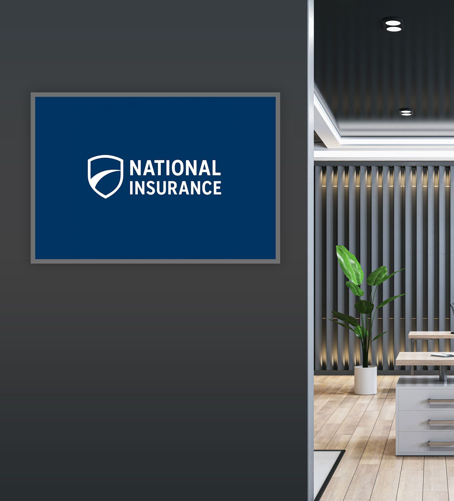 National Insurance logo on a blue background, mounted on a gray wall in an office.
