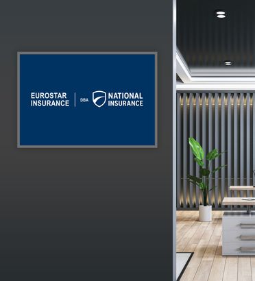 Logo for National Insurance displayed on a dark wall. Interior office with plant and desk visible.