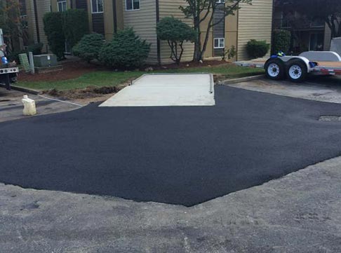 Concrete Dumpster Pad After - Asphalt Concrete Dumpster Pad in Kent, WA