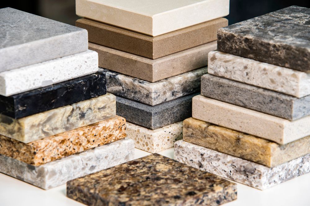 There are many different types of granite stacked on top of each other.