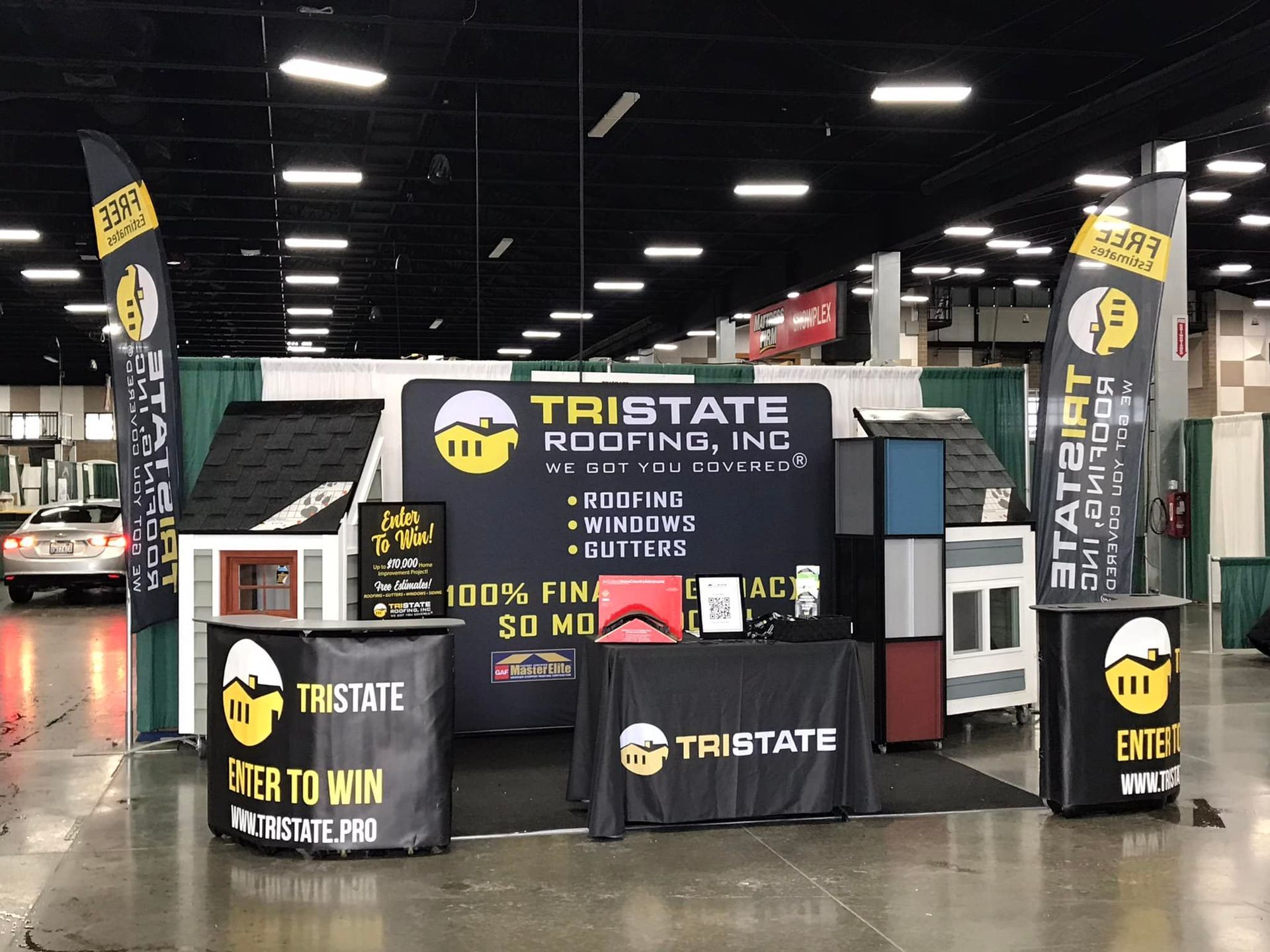 A tristate roofing inc booth at a trade show