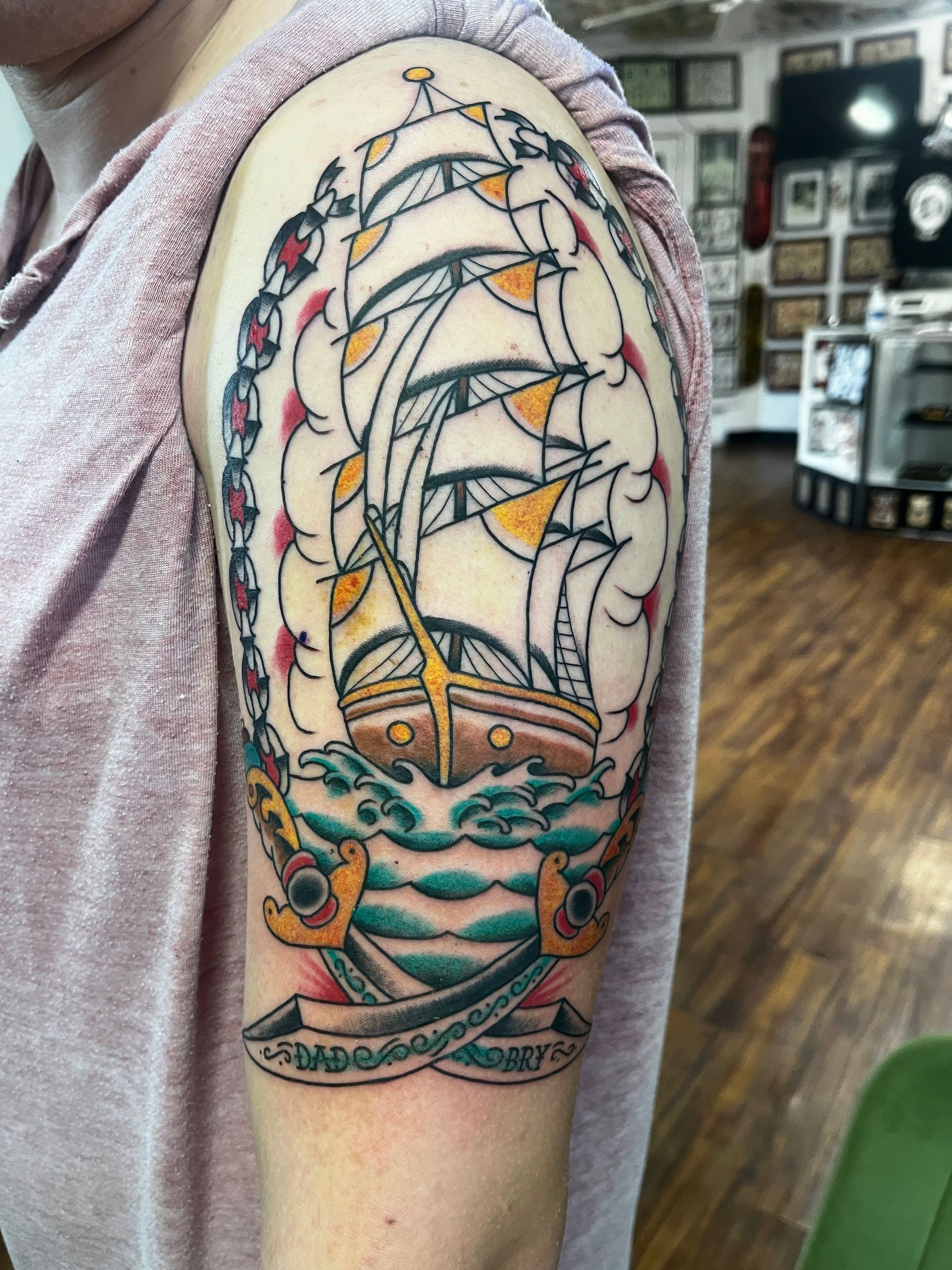 Boat tattoo by American Made Tattoo