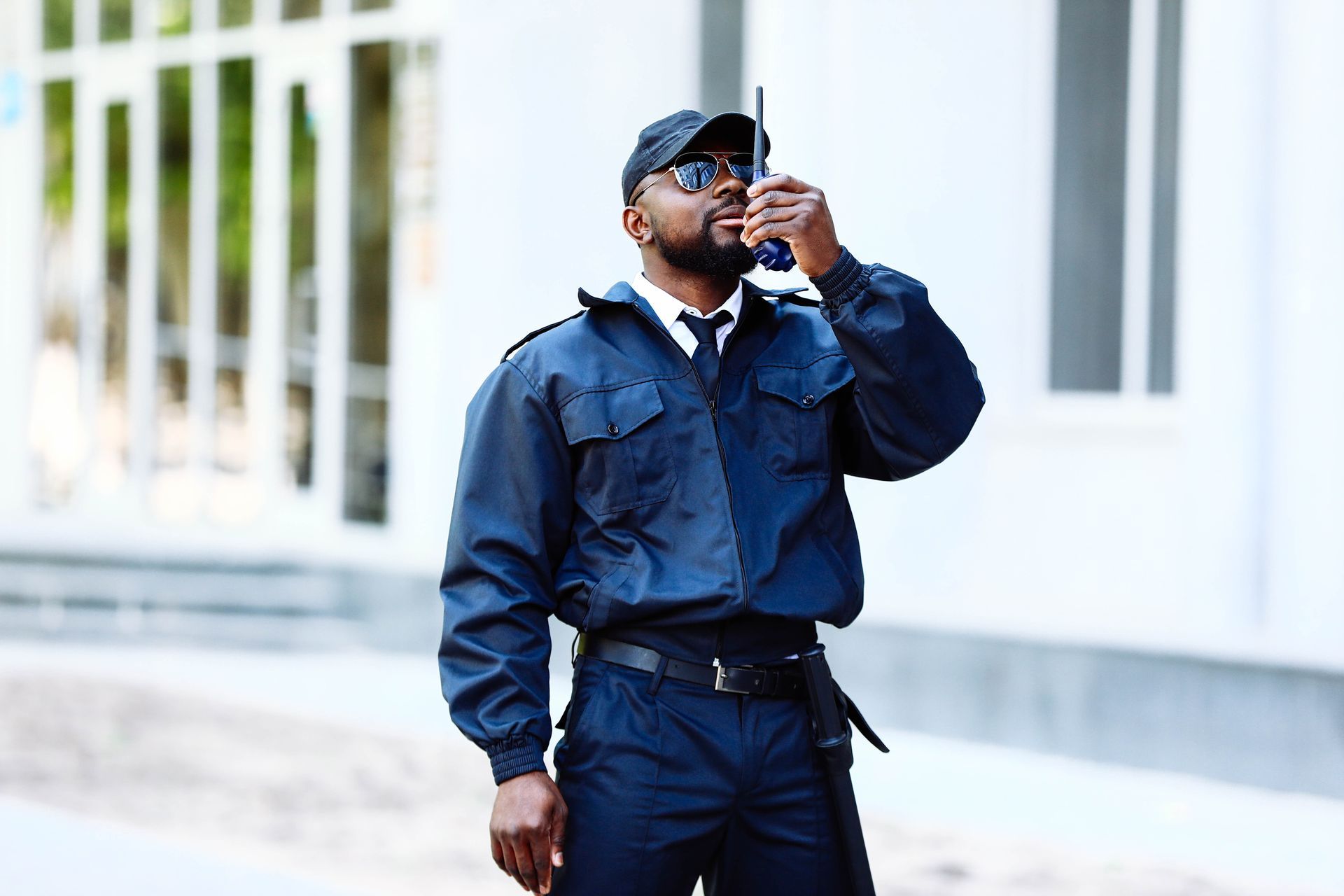 African-American security guard outdoors.