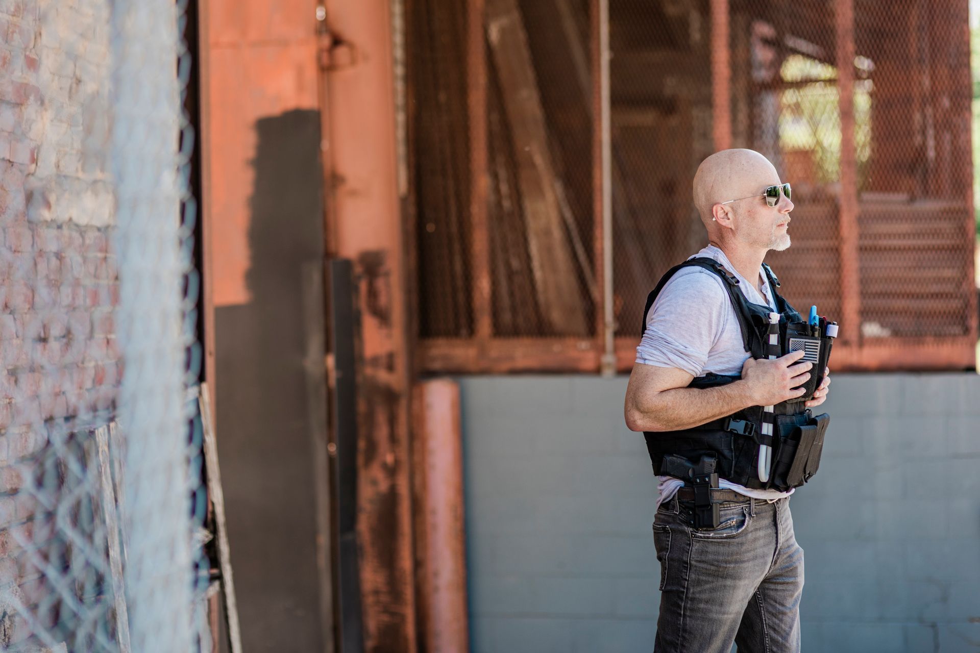 A security guard in a construction site. A security guard in a construction site.
