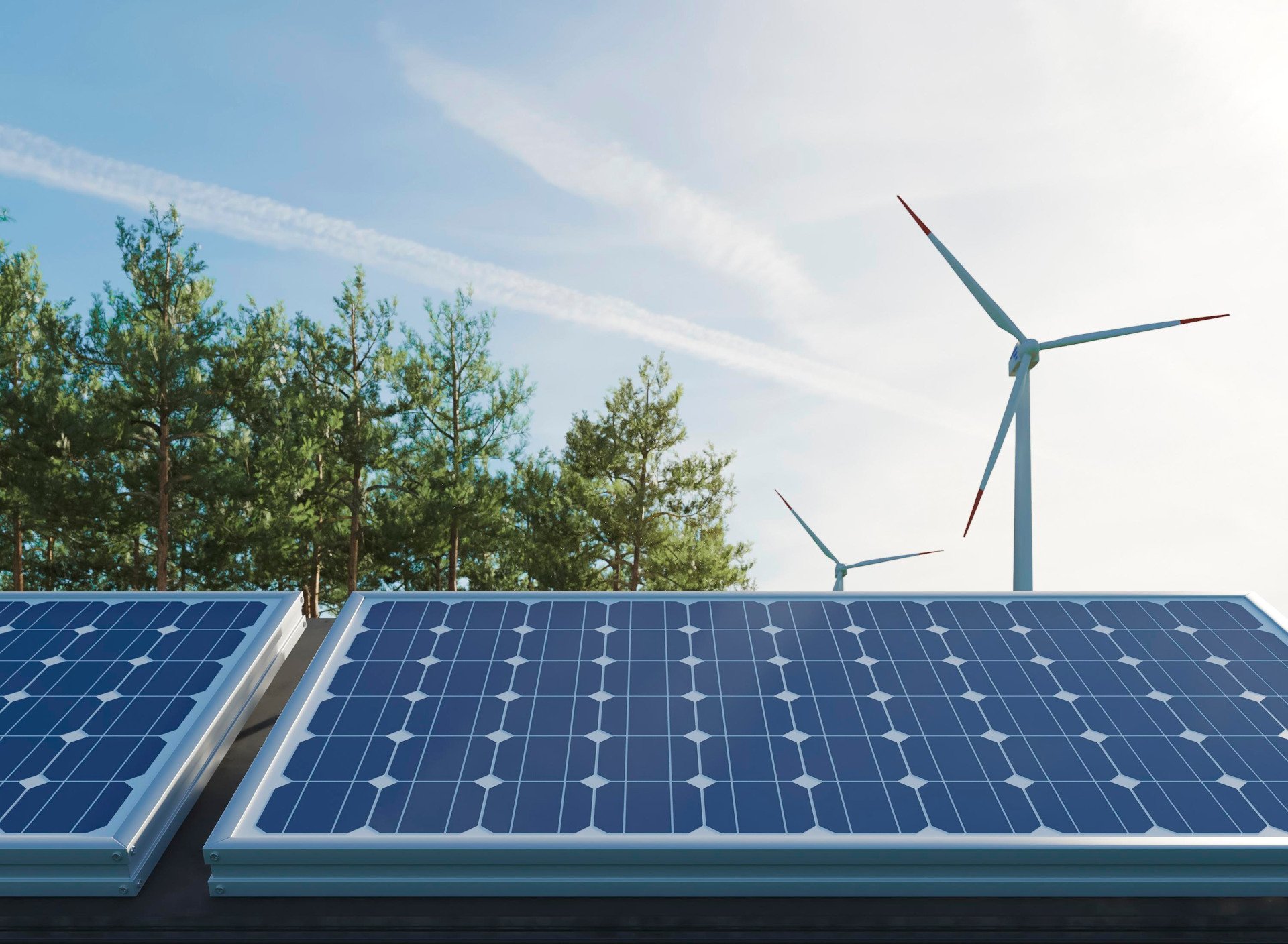 solar panels with wind turbines on the background