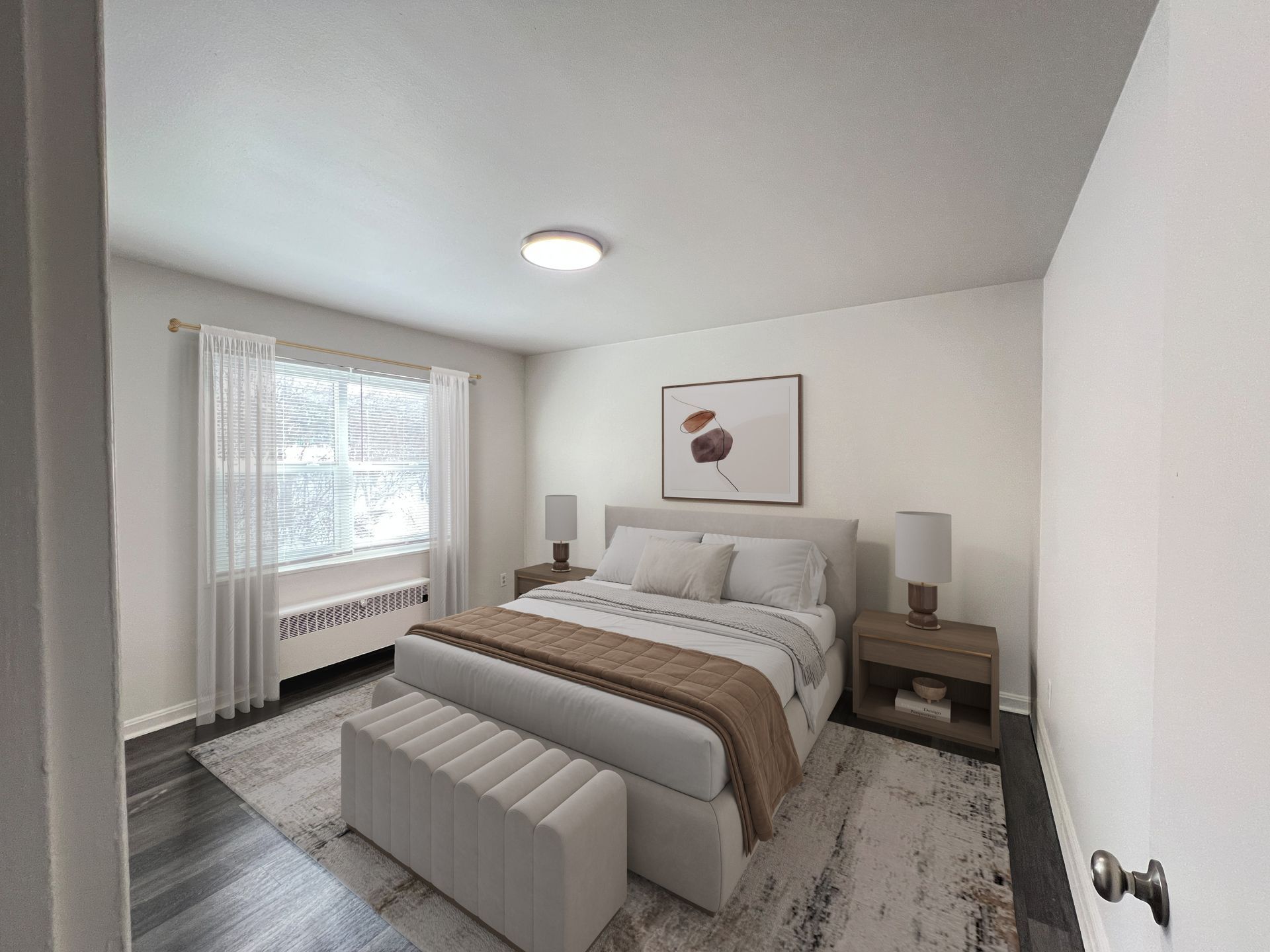 Bedroom with bed, nightstands, window with curtains, and rug.