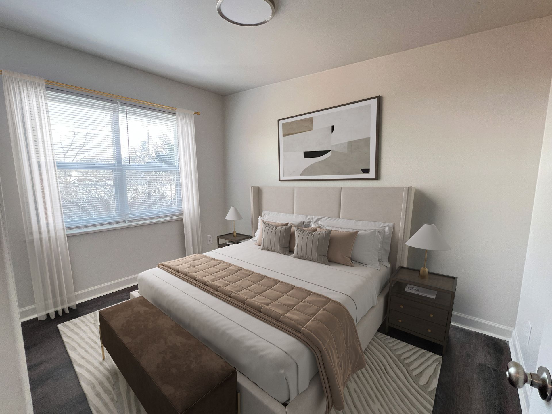 Bedroom with bed, bench, nightstands, window, and abstract art.