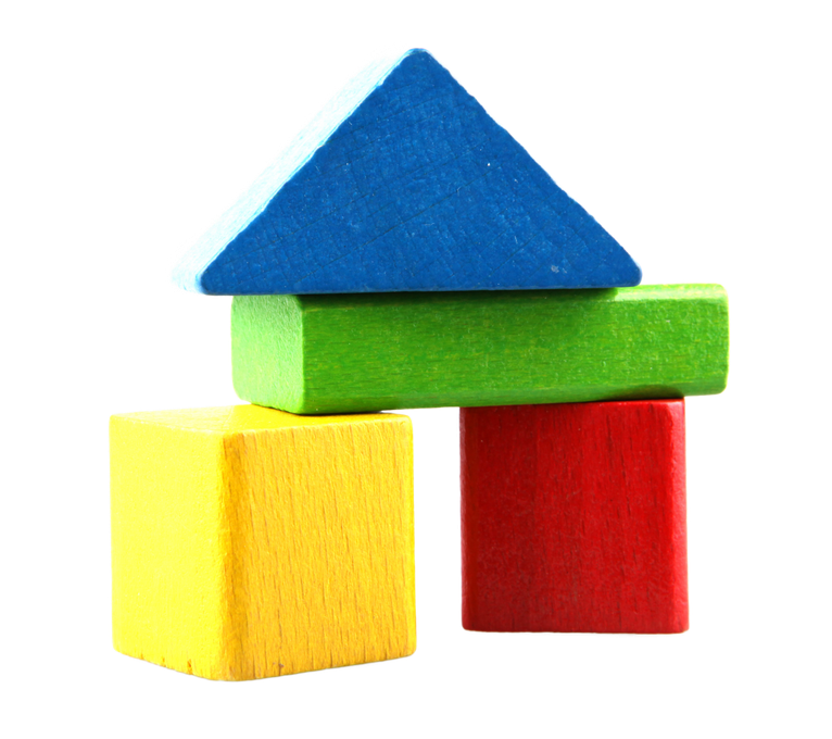 A stack of colorful wooden blocks with a blue triangle on top