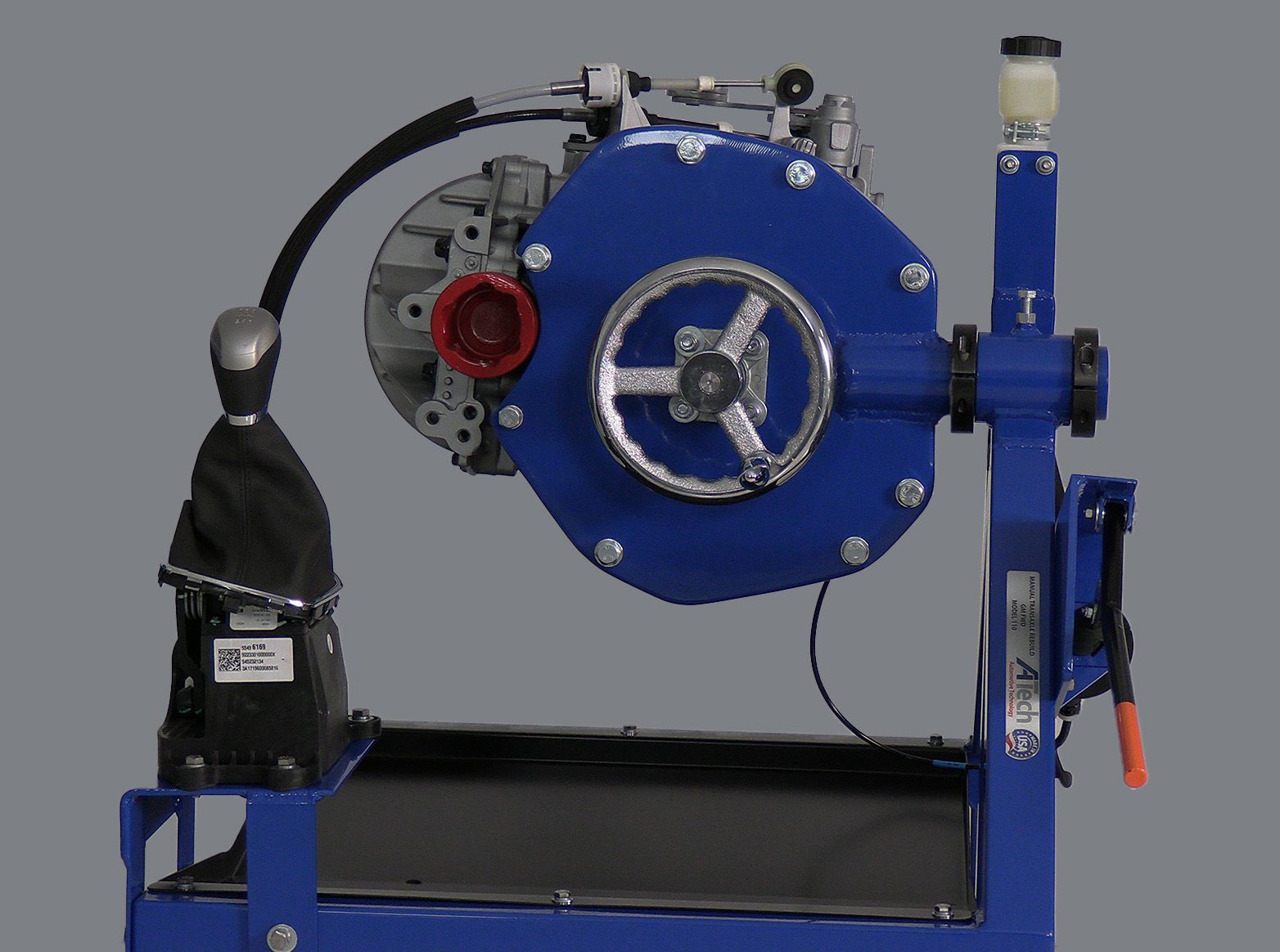 A blue machine with a steering wheel attached to it