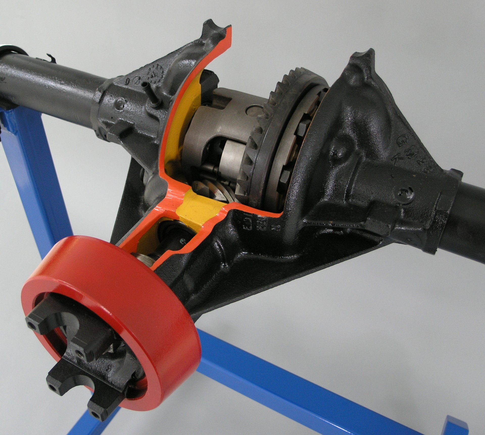 A model of a rear differential is cut in half