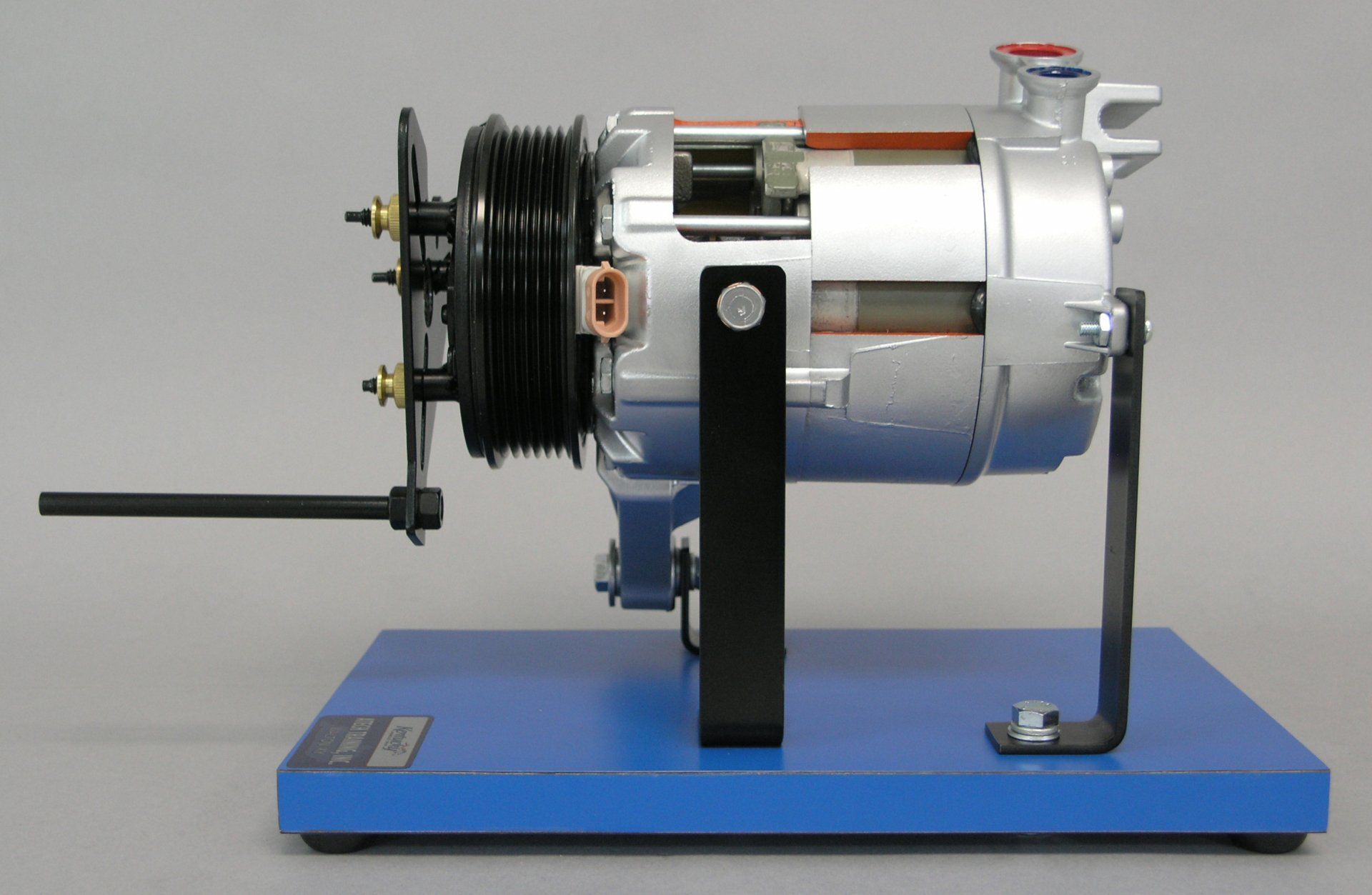 A model of a car air conditioner on a blue base