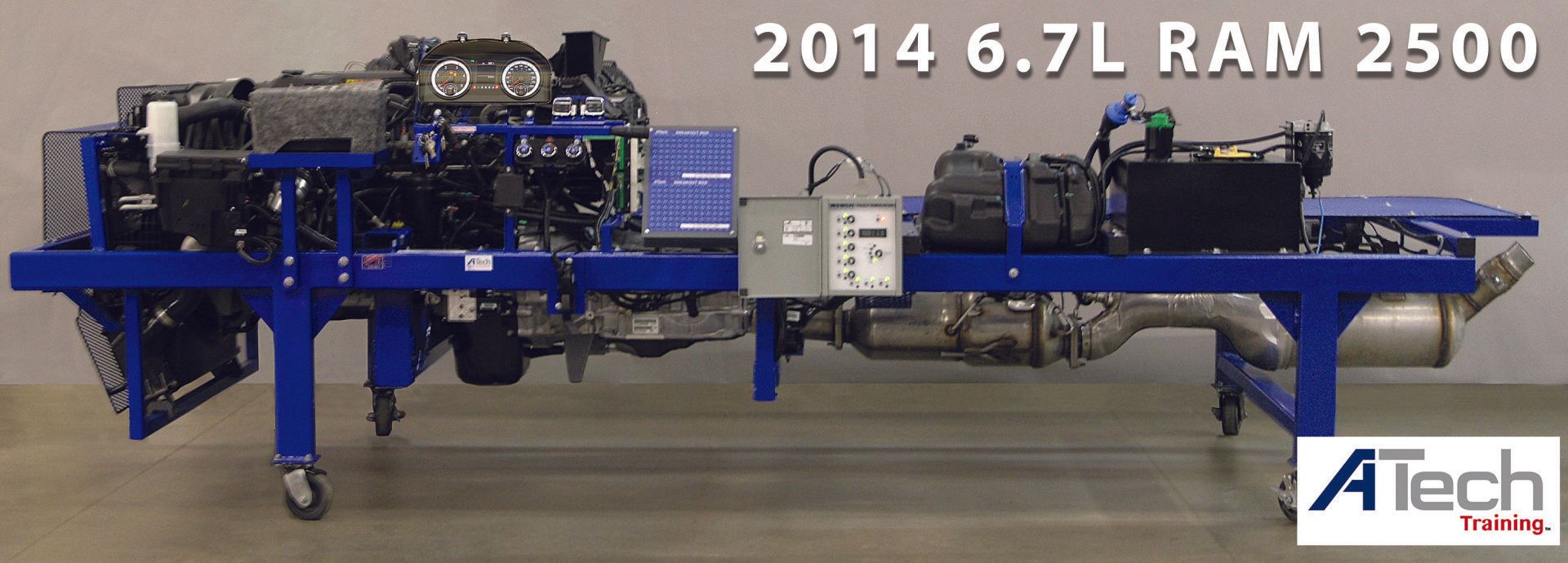 A ram 2500 engine is displayed on a blue stand