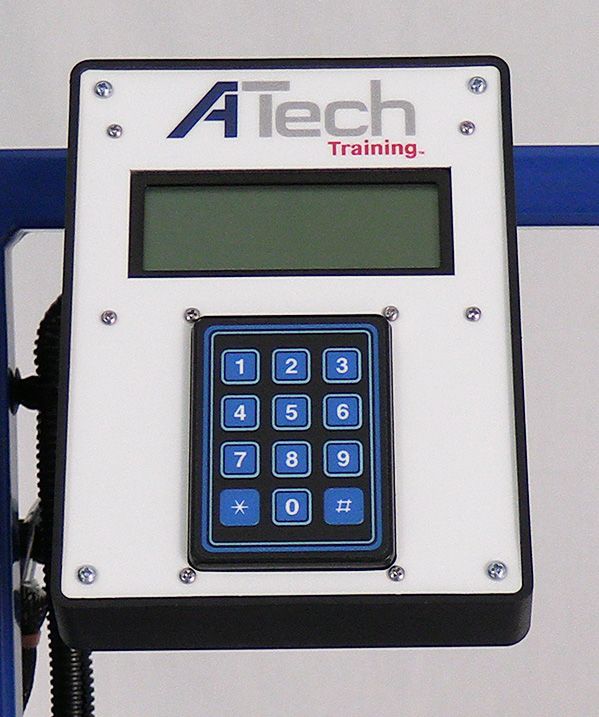 A black and white atech training device with blue buttons