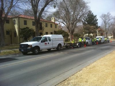 Landscaping — Pick-up Trucks and Workers Alongside the Road in El Paso, TX