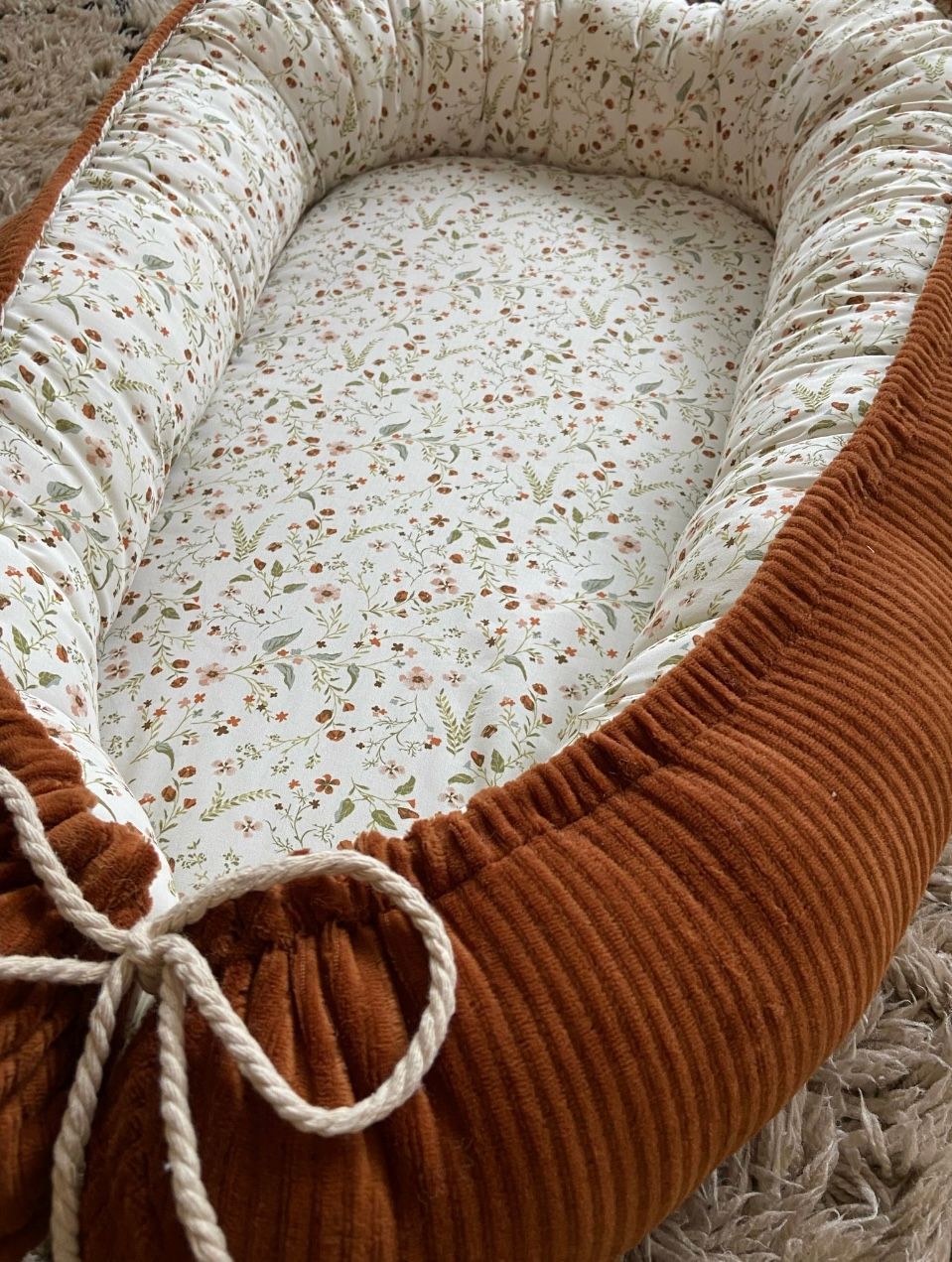 Babynestje millefleurs cognac rib