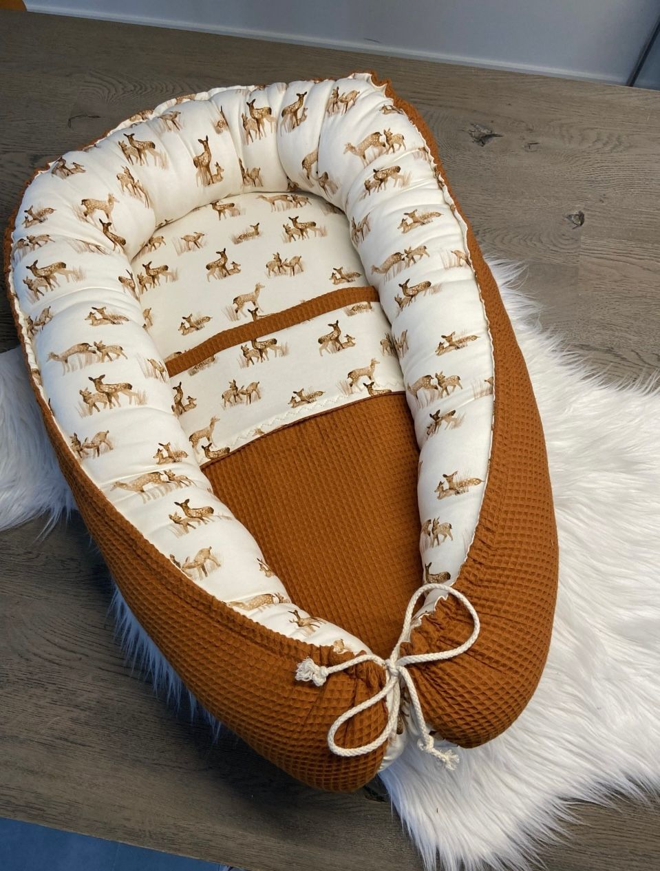 Babynestje fawn cognac