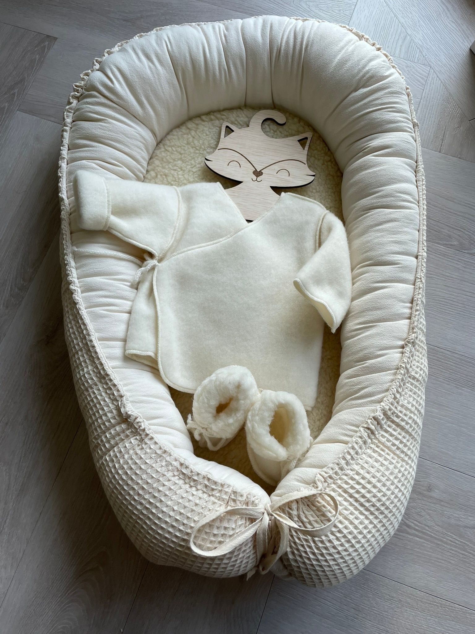 Newborn vestje merino wol naturel