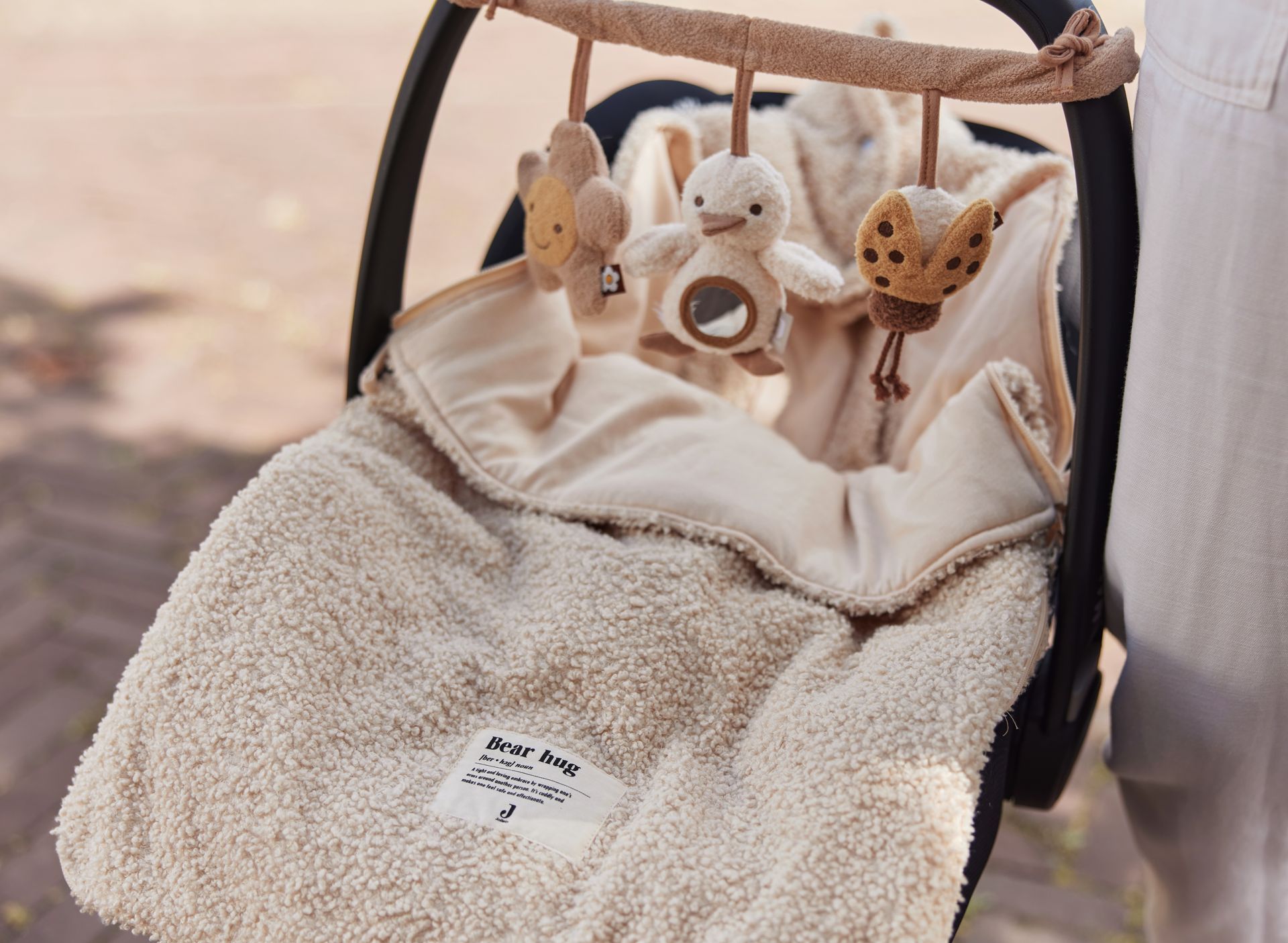 Voetenzak bouclé naturel - Jollein - met strik