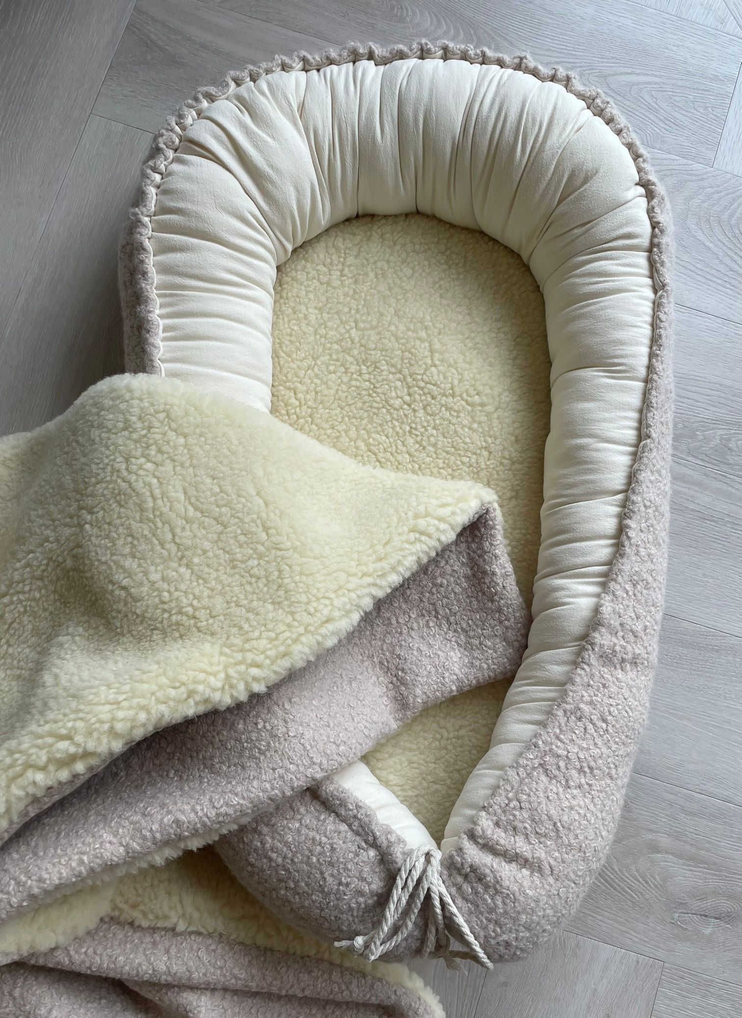 Babynestje wol boulcé beige