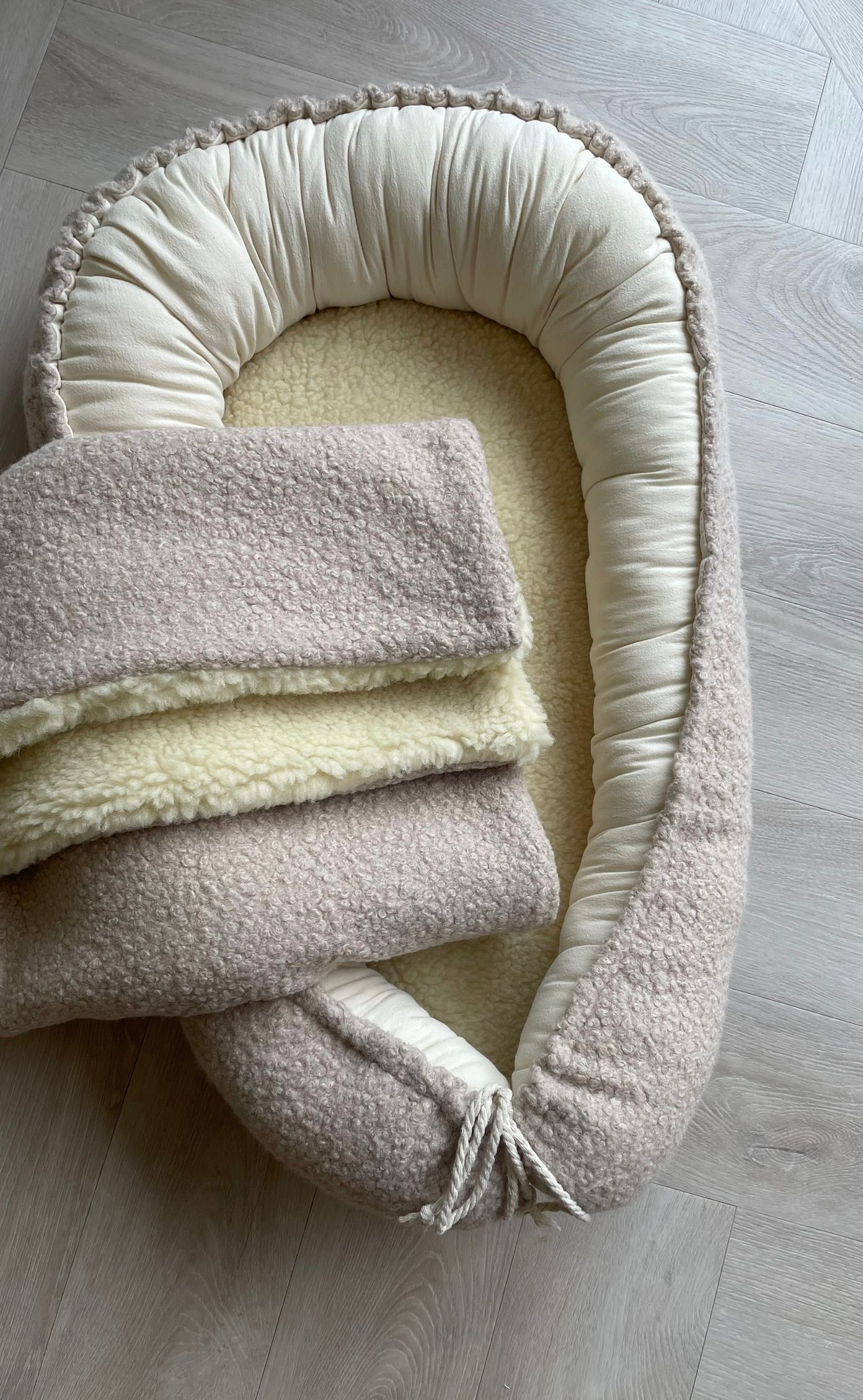 Babynestje wol boulcé beige