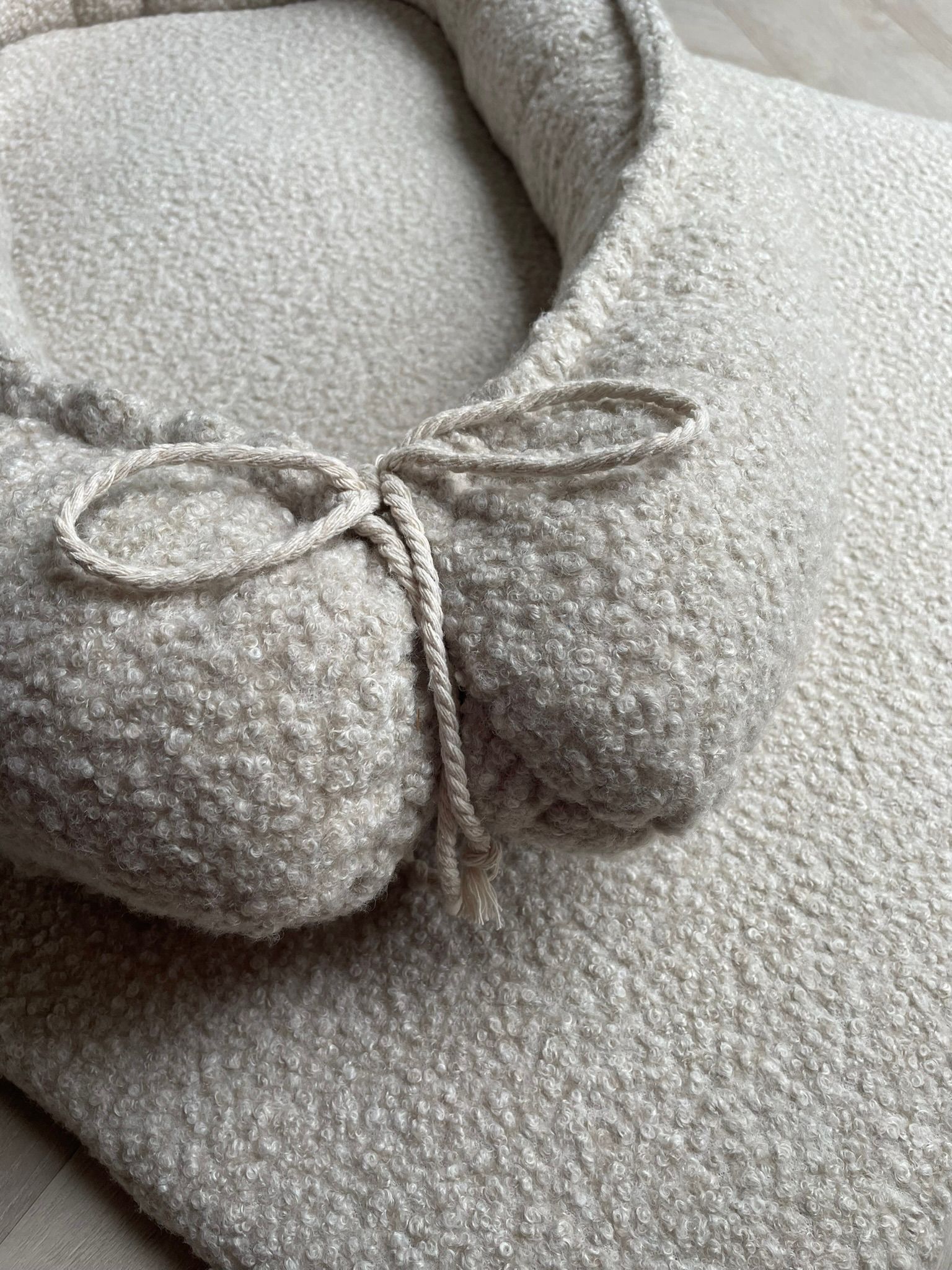 Babynestje full bouclé beige melange