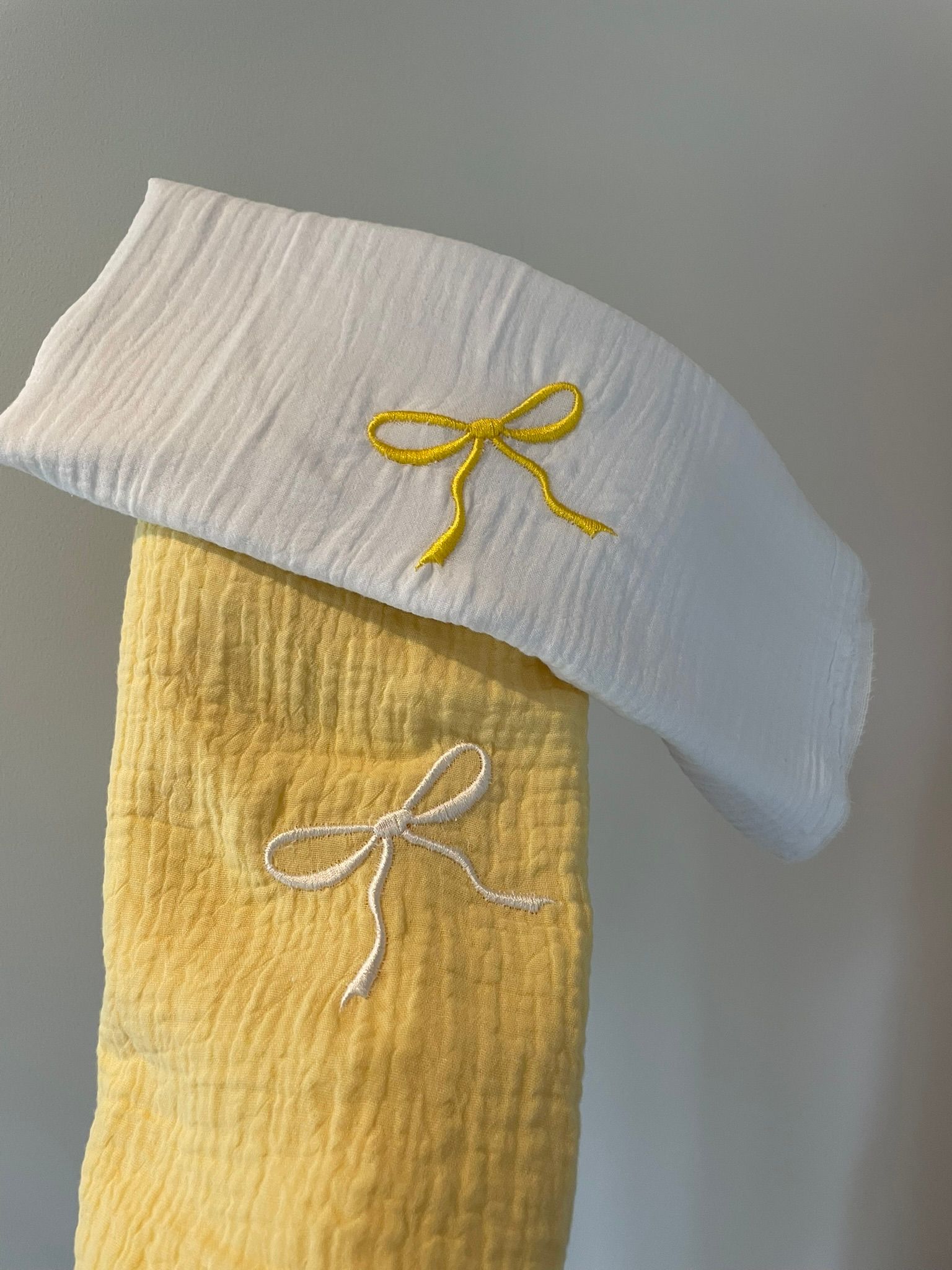 Swaddle hydrofiele doek strik geel