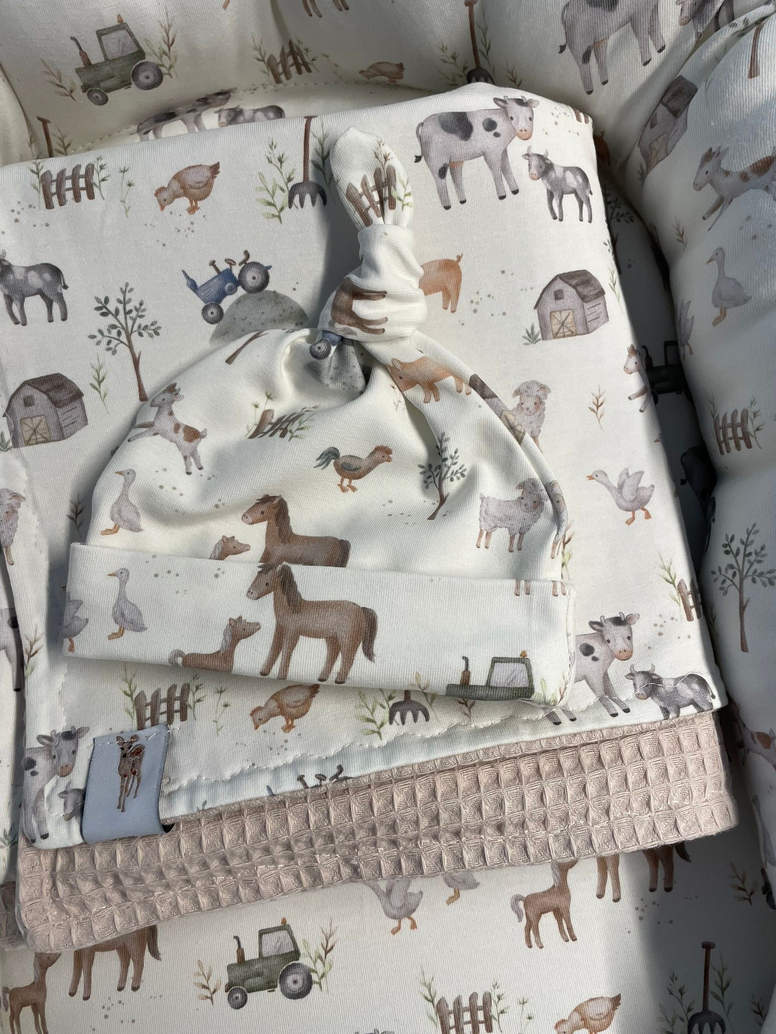 Babynestje boerderij beige