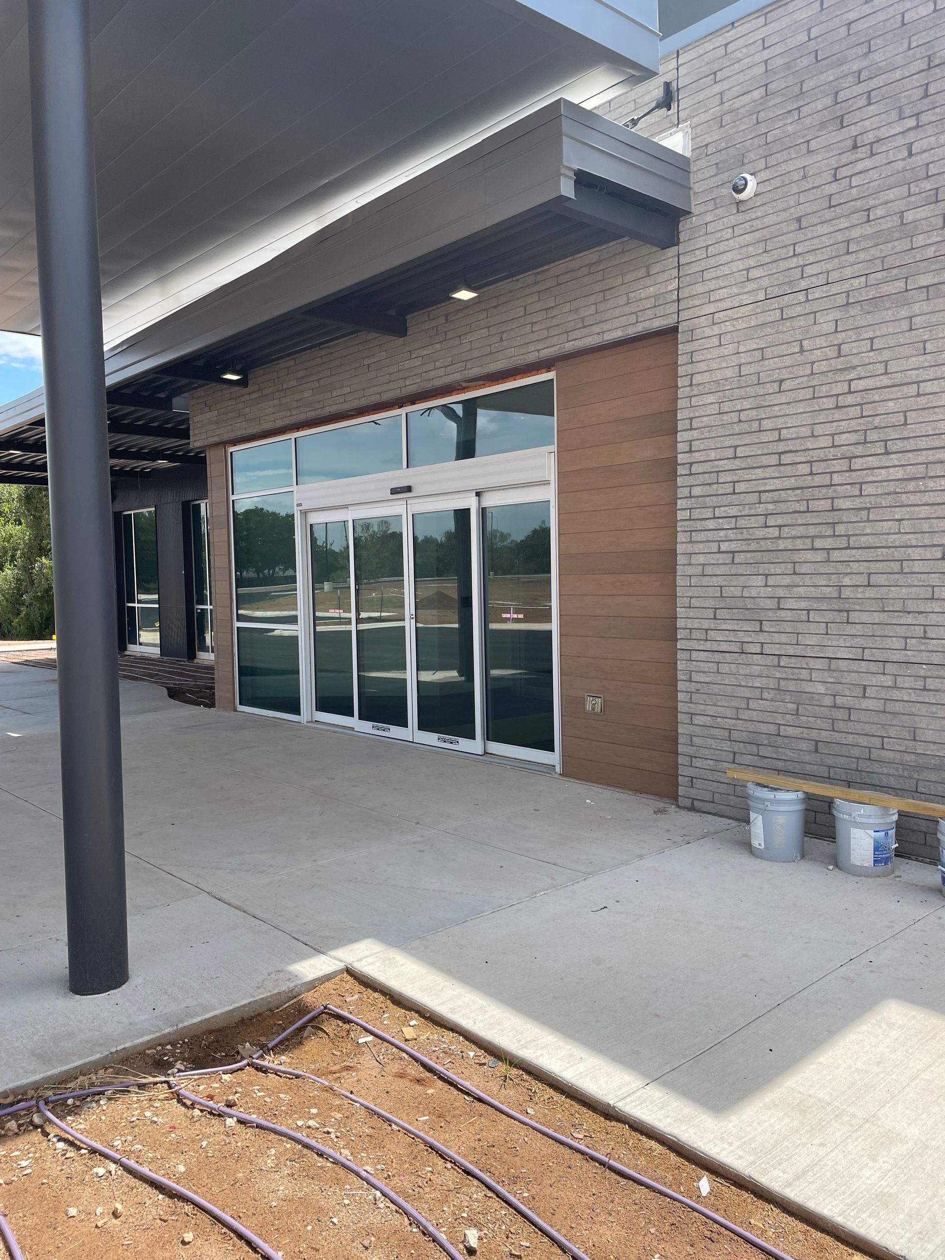 A large building with a lot of windows is being built.