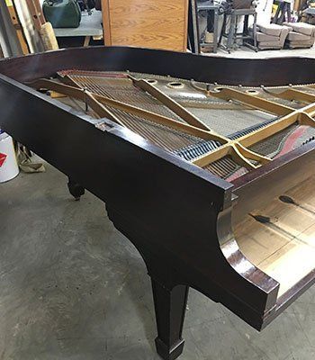 Steinway & Son's Grand Piano restoration  task in progress (one image is repeated)