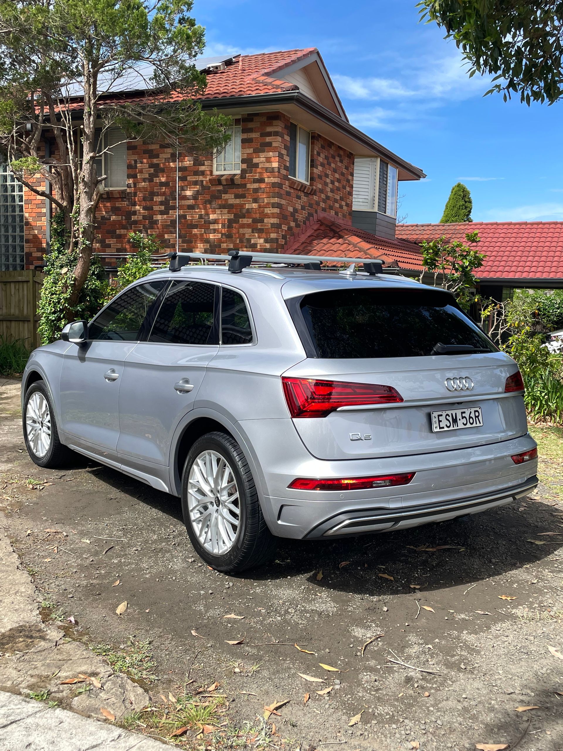 Gray car parked in the driveway
