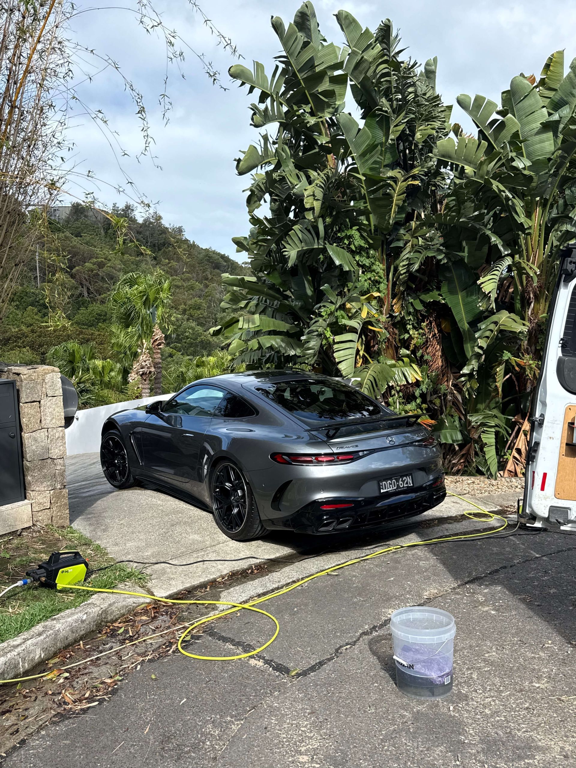 Back view of black car.