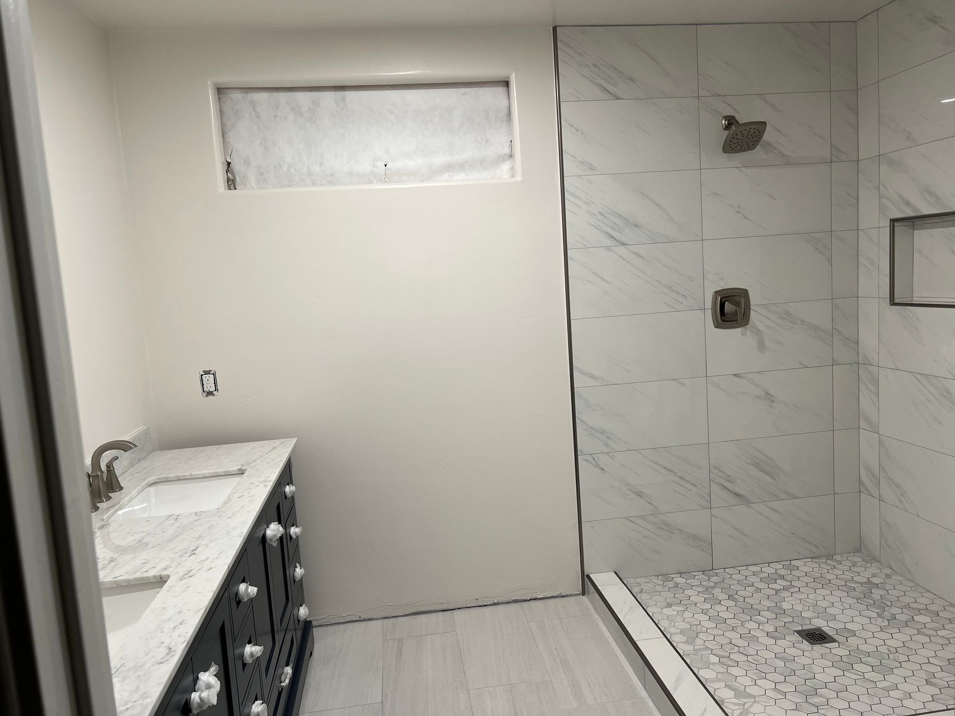 Air conditioning units with toolbox and gloves in backyard.