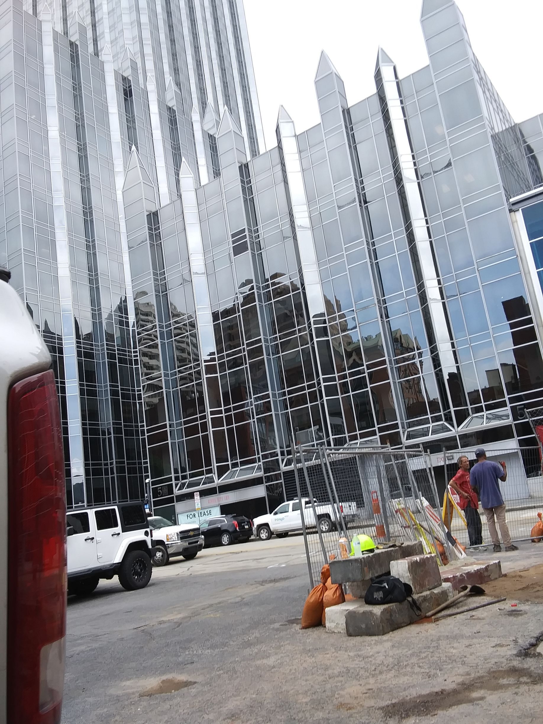 building in down town pittsburgh behind demolition site