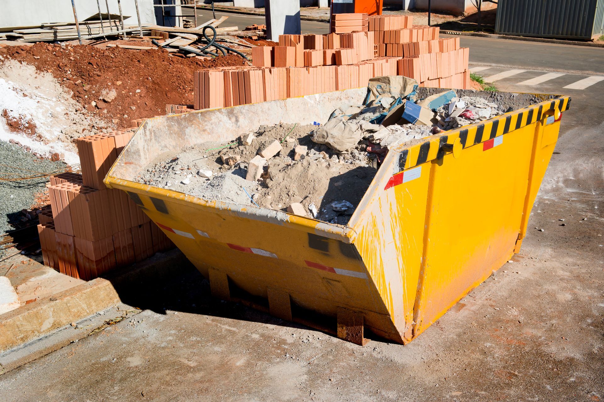 full dumpster ready to be picked up from the customer