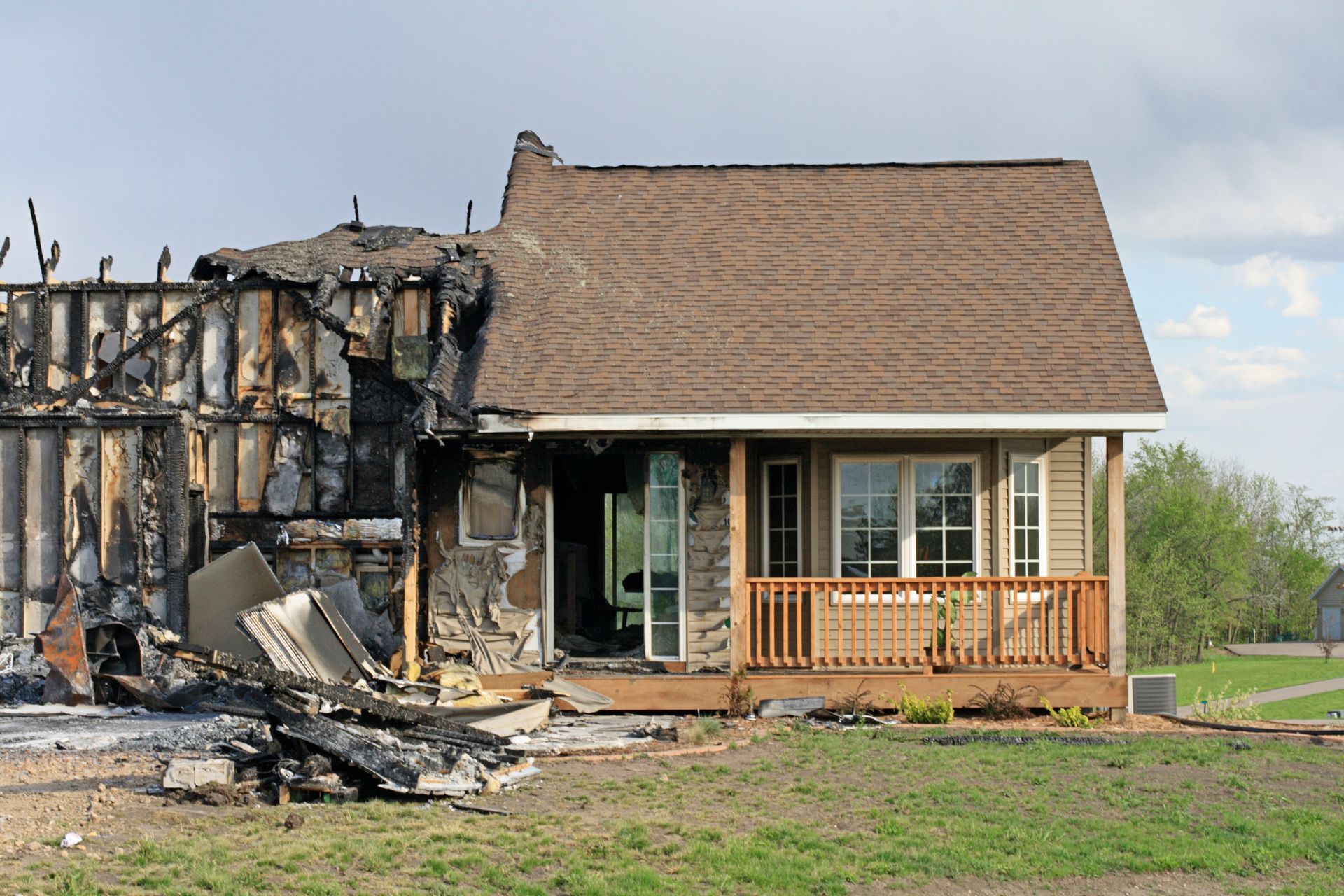 house partially damaged by fire that is a candidate for selective structure demolition