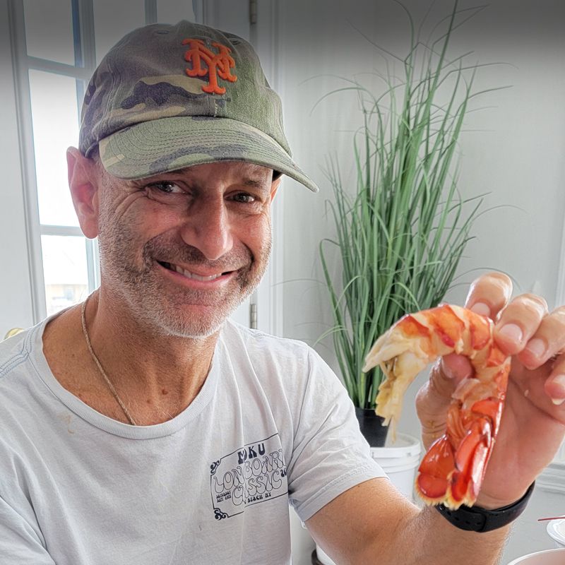 Customer Enjoying All You Can Lobster Tails on Wet T-Shirt Night