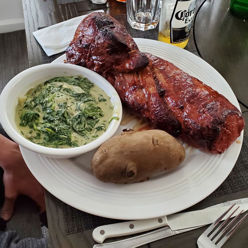 Whole Filet Mignon Tenderloin with Baked Potato and Creamed Spinach