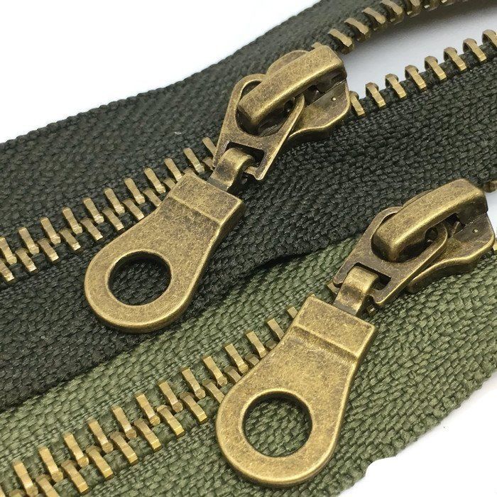 Zippers with copper chain and pull tab