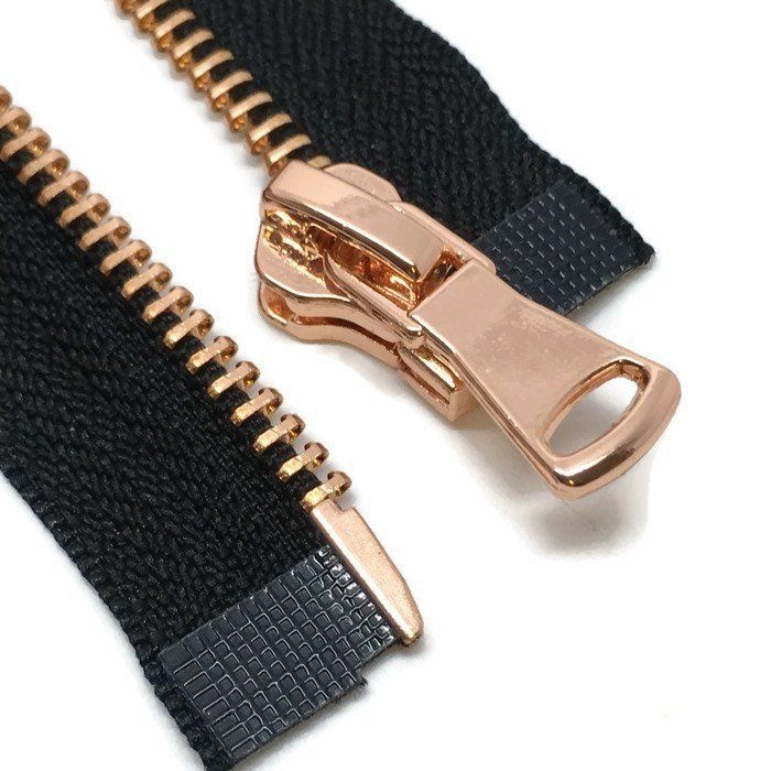 Black zipper with copper chain and pull tab