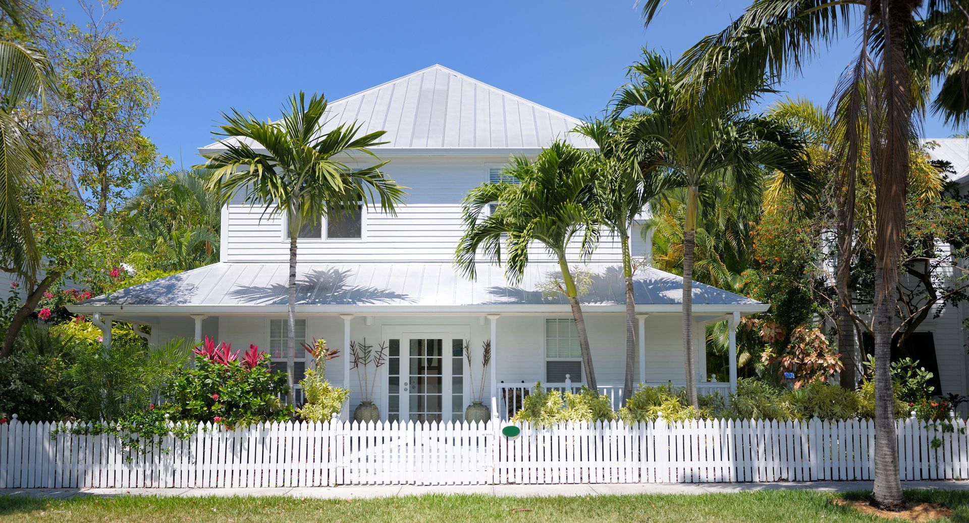 Huge House With Palm Trees In Florida - Flagler County, FL - Screen Windows Painting Services