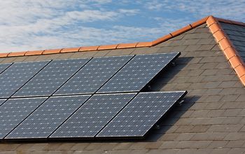 A roof with a lot of solar panels on it