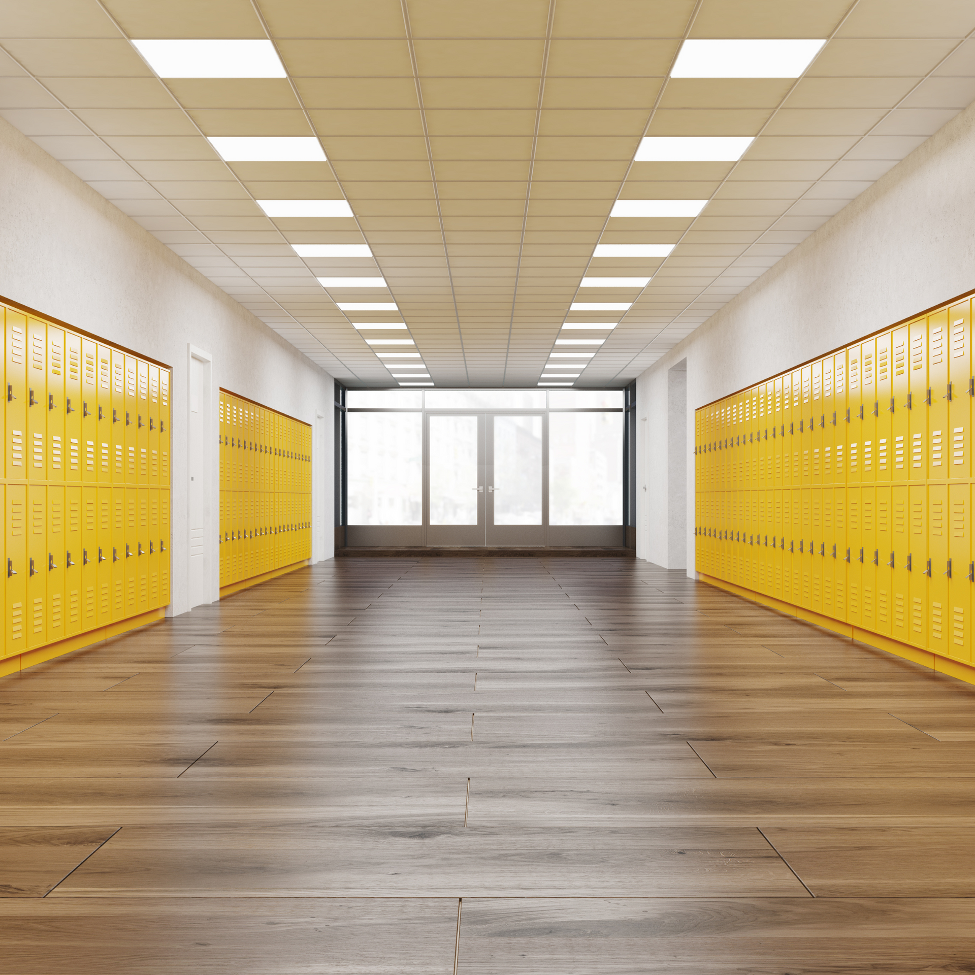 Yellow school lockers line a hallway with wooden floors, leading to glass doors at the end.