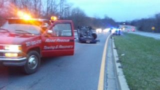 Car is Being Towed by Truck