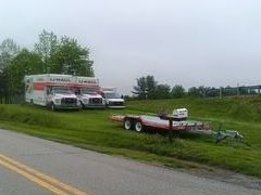 Car is Being Towed by Truck