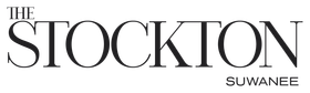 "The Stockton Suwanee" logo with text.