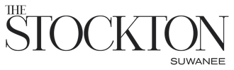"The Stockton Suwanee" logo with text.