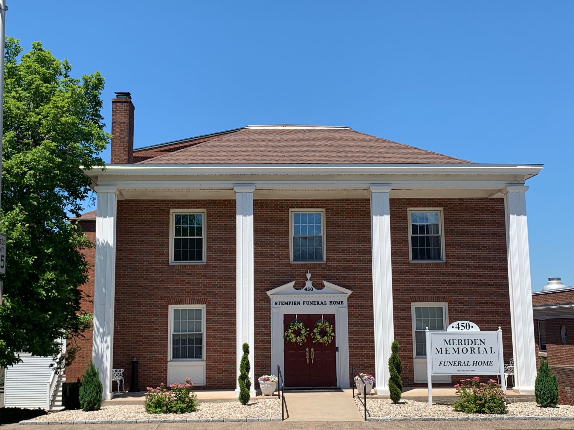 Brick building with white columns, 