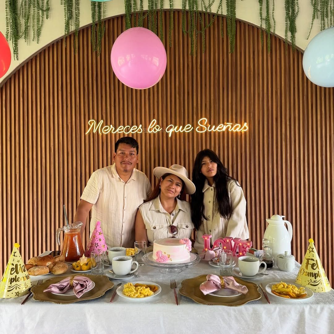 A starry night sky with trees in the foreground