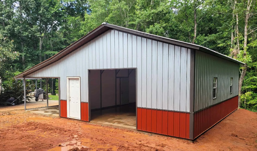 Metal building with red and silver siding, open bays, and a covered side area.