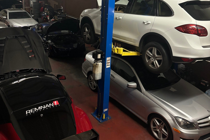 European Vehicles Inside Auto Repair Shop Service Area | Extreme Boost Care